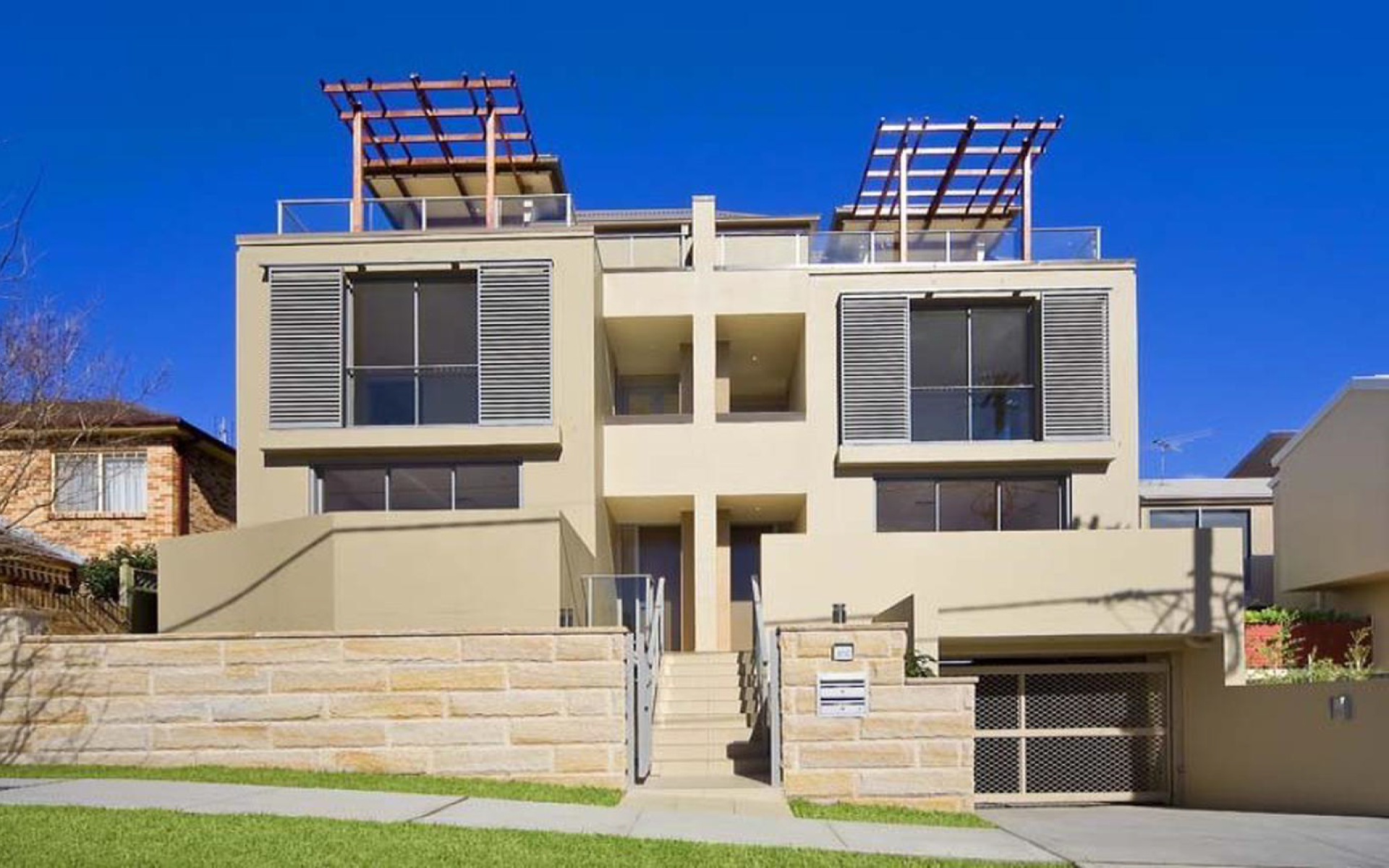 Double-storey brick residence completed by Masterbuild Constructions