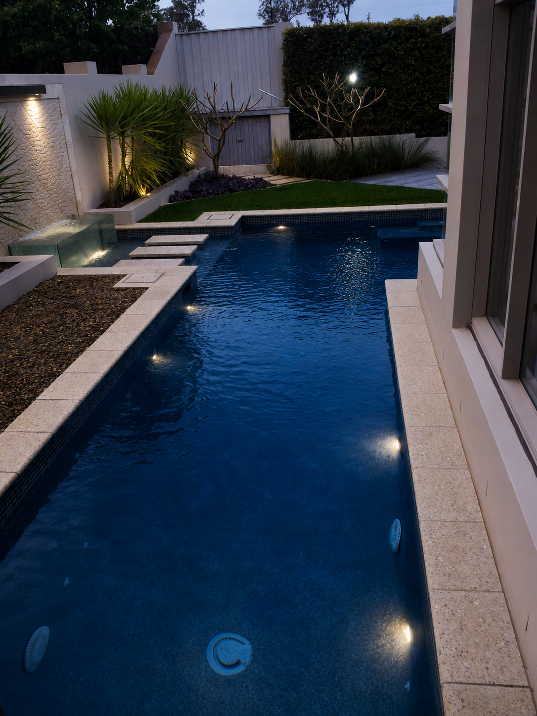 Custom swimming pool with landscaped outdoor entertaining area